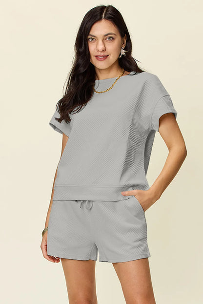 Trendsi mocha double take full-size textured short sleeve T-shirt and drawstring shorts set on a model.