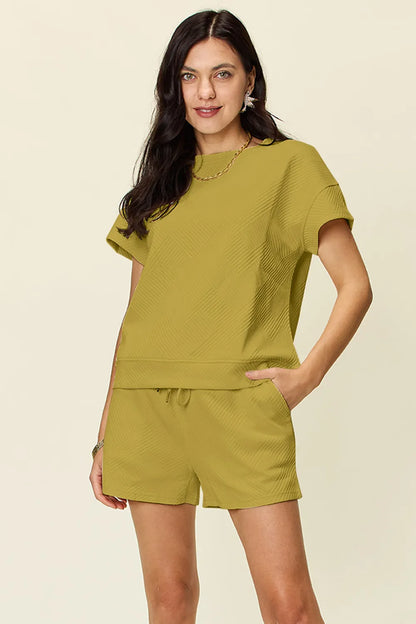Trendsi mocha double take full size texture short sleeve T-shirt and drawstring shorts set on a model.