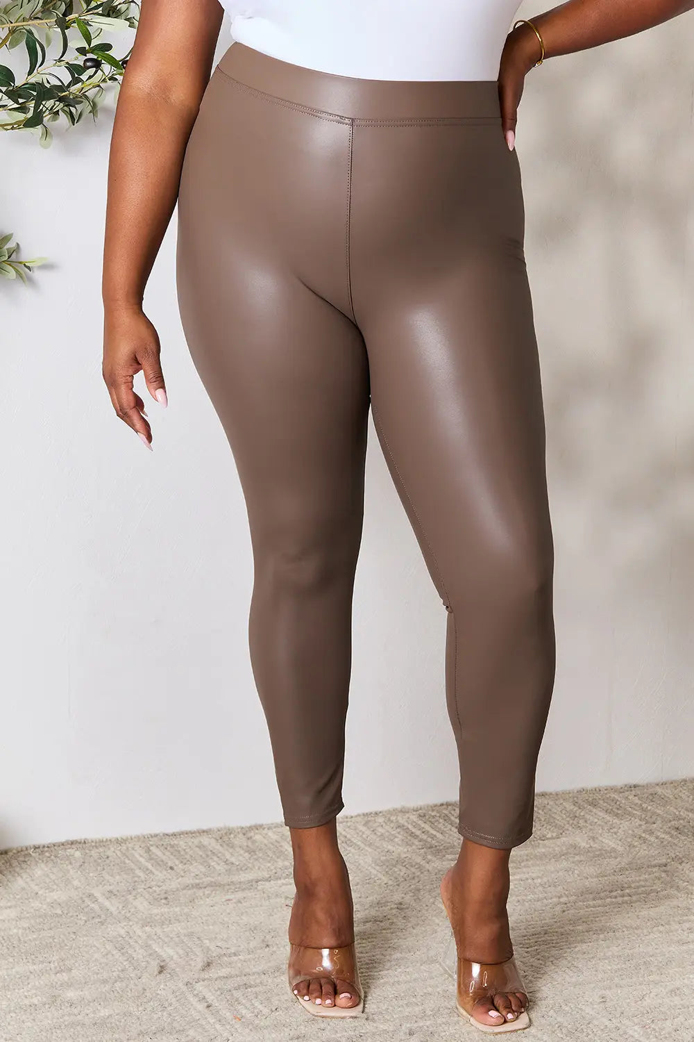 Full size mocha high waist skinny pants by Trendsi, featuring a flattering fit and sleek design, shown on a model.