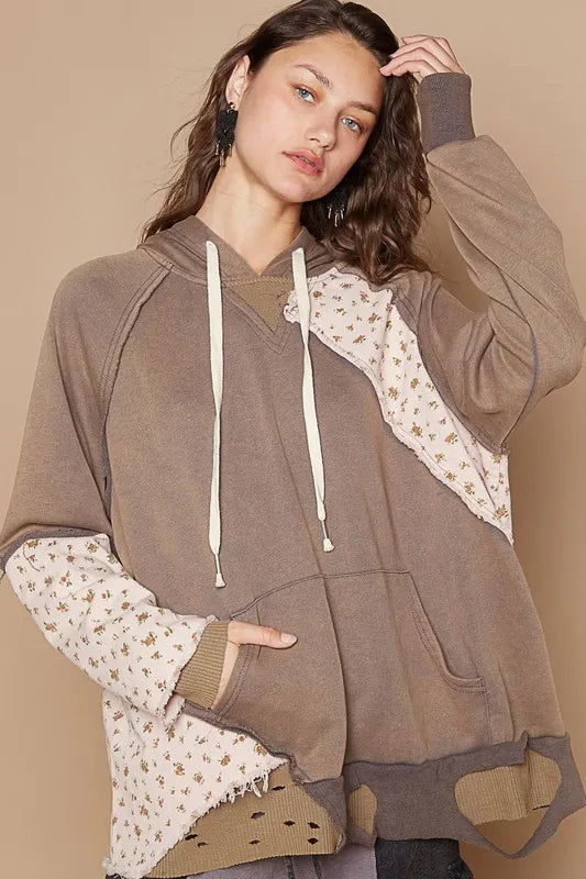 Mocha floral patchwork distressed drawstring hoodie from Trendsi with casual fit and cozy fabric, featuring floral patch embellishments.