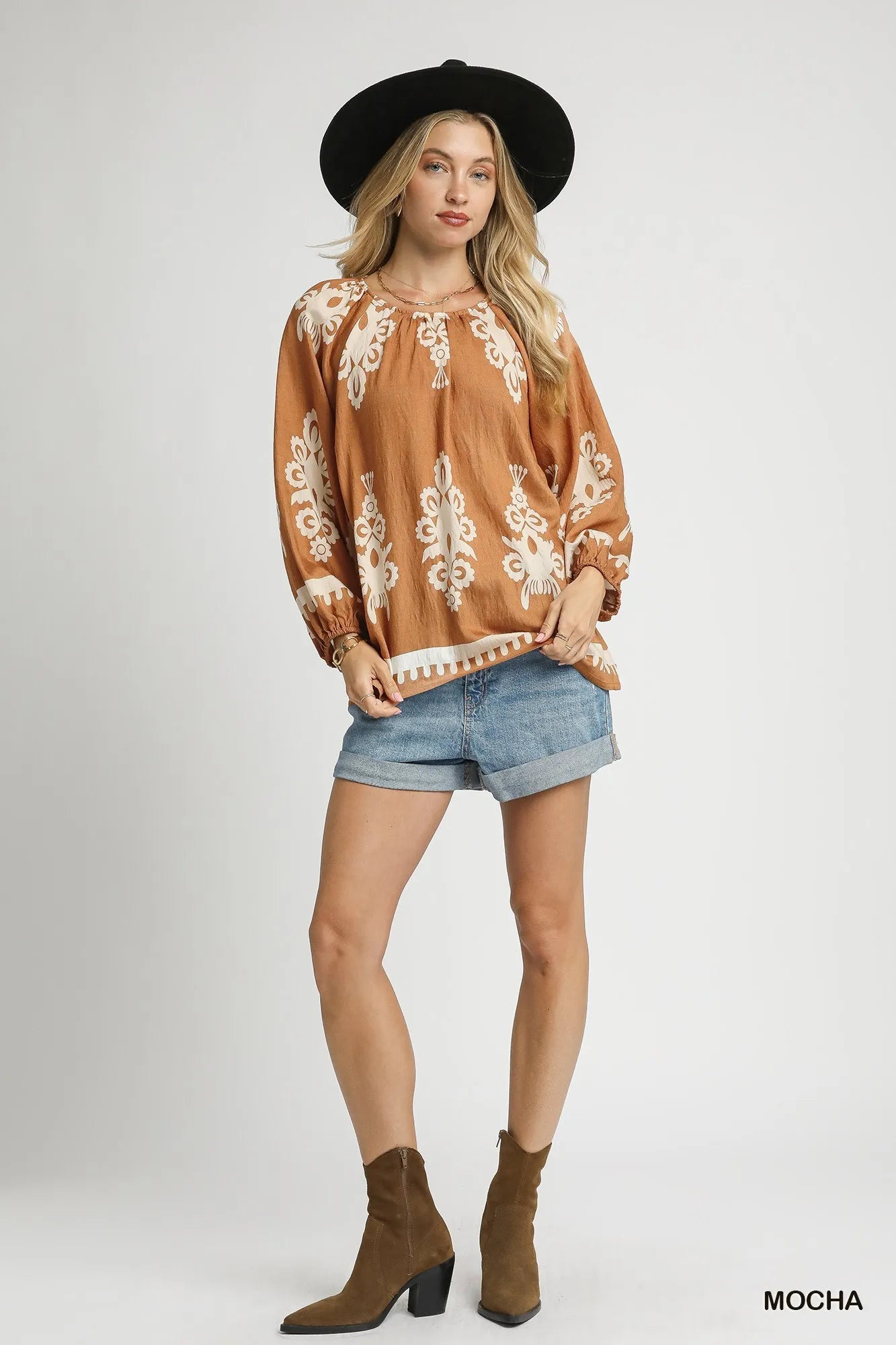 Plus size Umgee two-tone border print top with balloon sleeves, featuring a stylish design and comfortable fit.