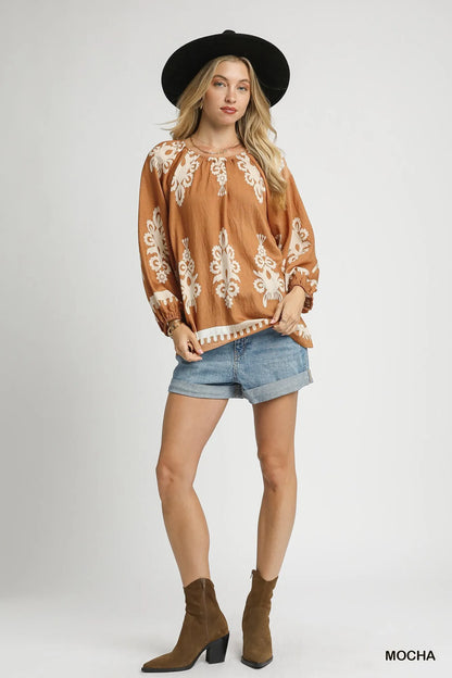 Plus size Umgee two-tone border print top with balloon sleeves, featuring a stylish design and comfortable fit.