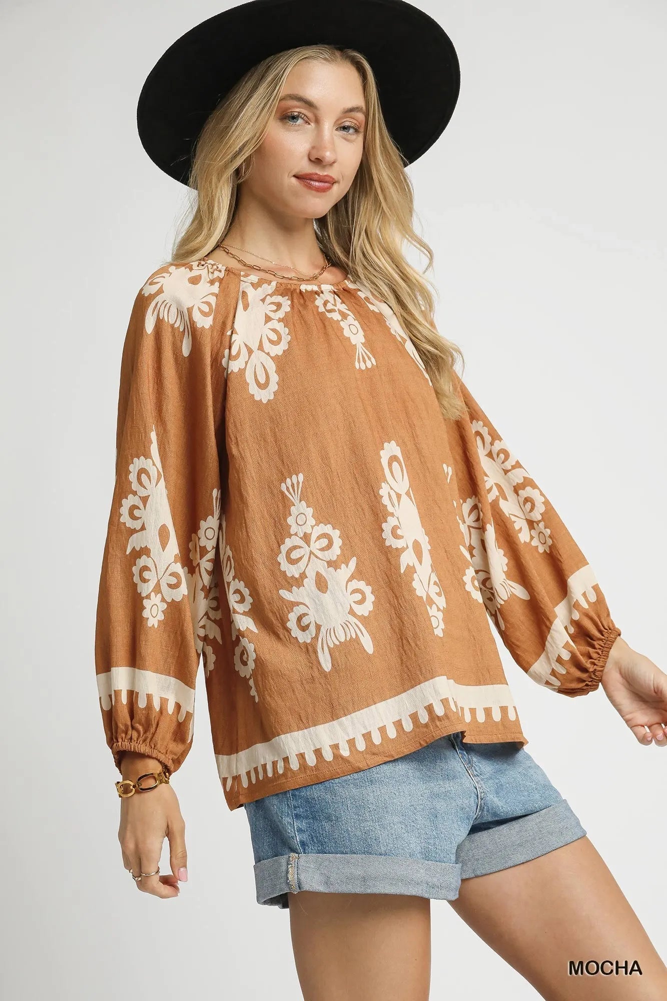 Plus size Umgee two-tone border print top with balloon sleeves, in mocha, featuring a stylish full-size design and casual elegance.
