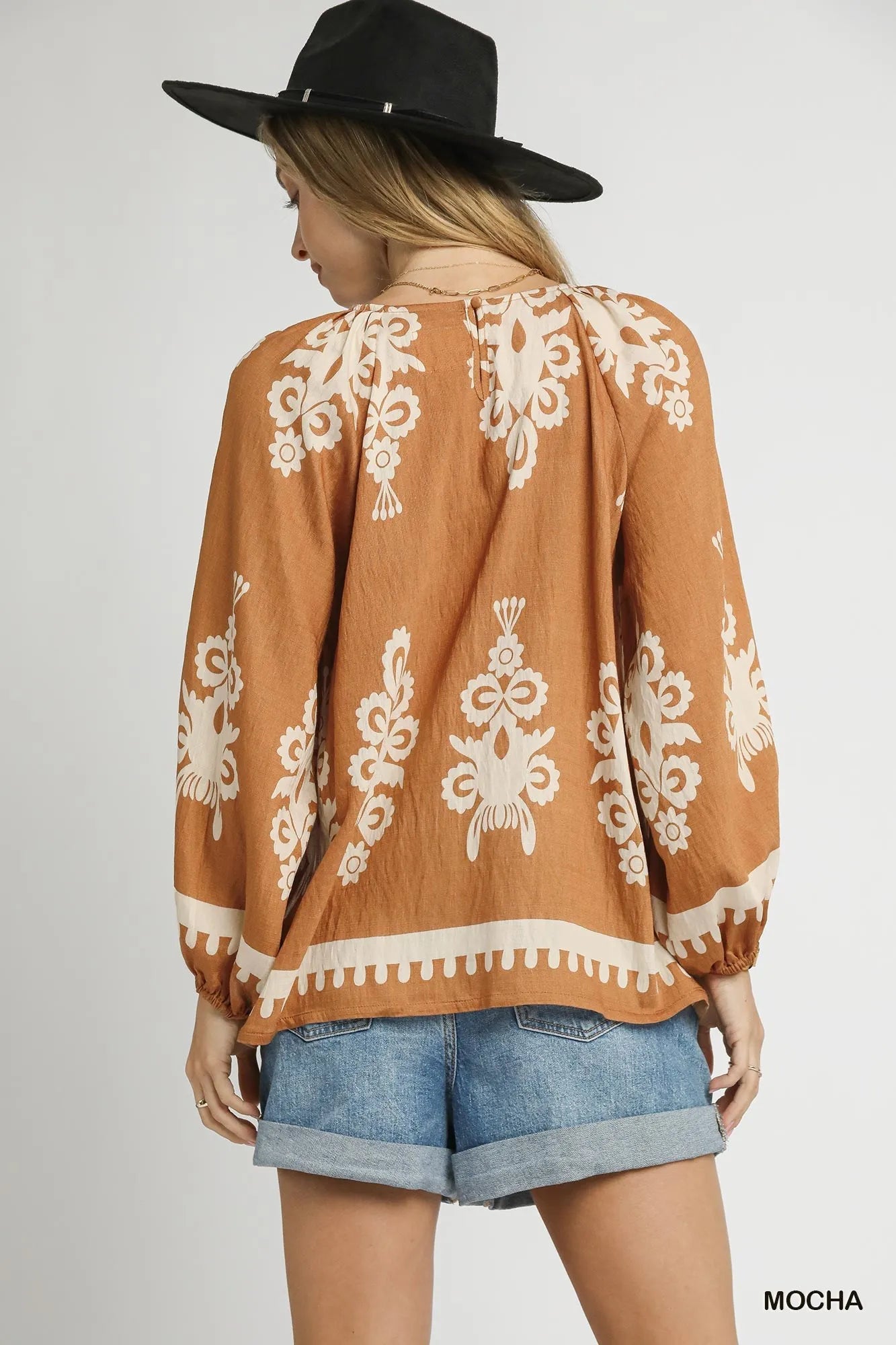 Plus size Umgee two-tone border print top with balloon sleeves, featuring a stylish casual fit.