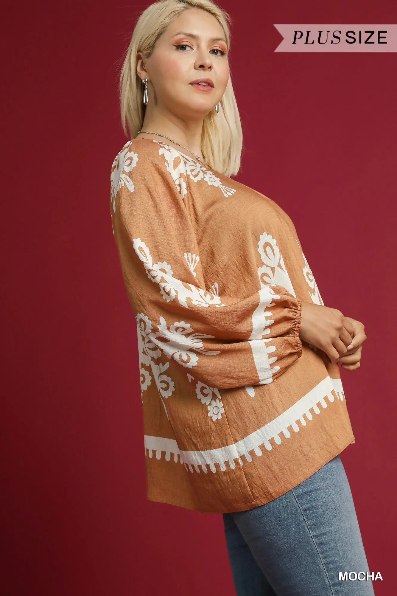 Plus size Umgee two-tone border print top with balloon sleeves, featuring a full-size fit and trendy design in mocha.