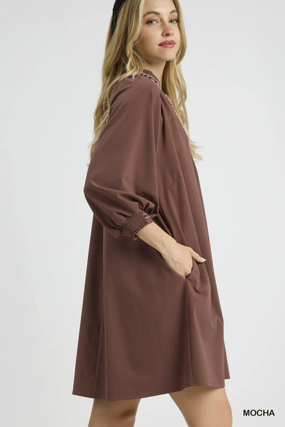 Mocha Umgee notched shift dress with trim detail, stylish casual dress featuring a notch neckline and decorative trim accents.