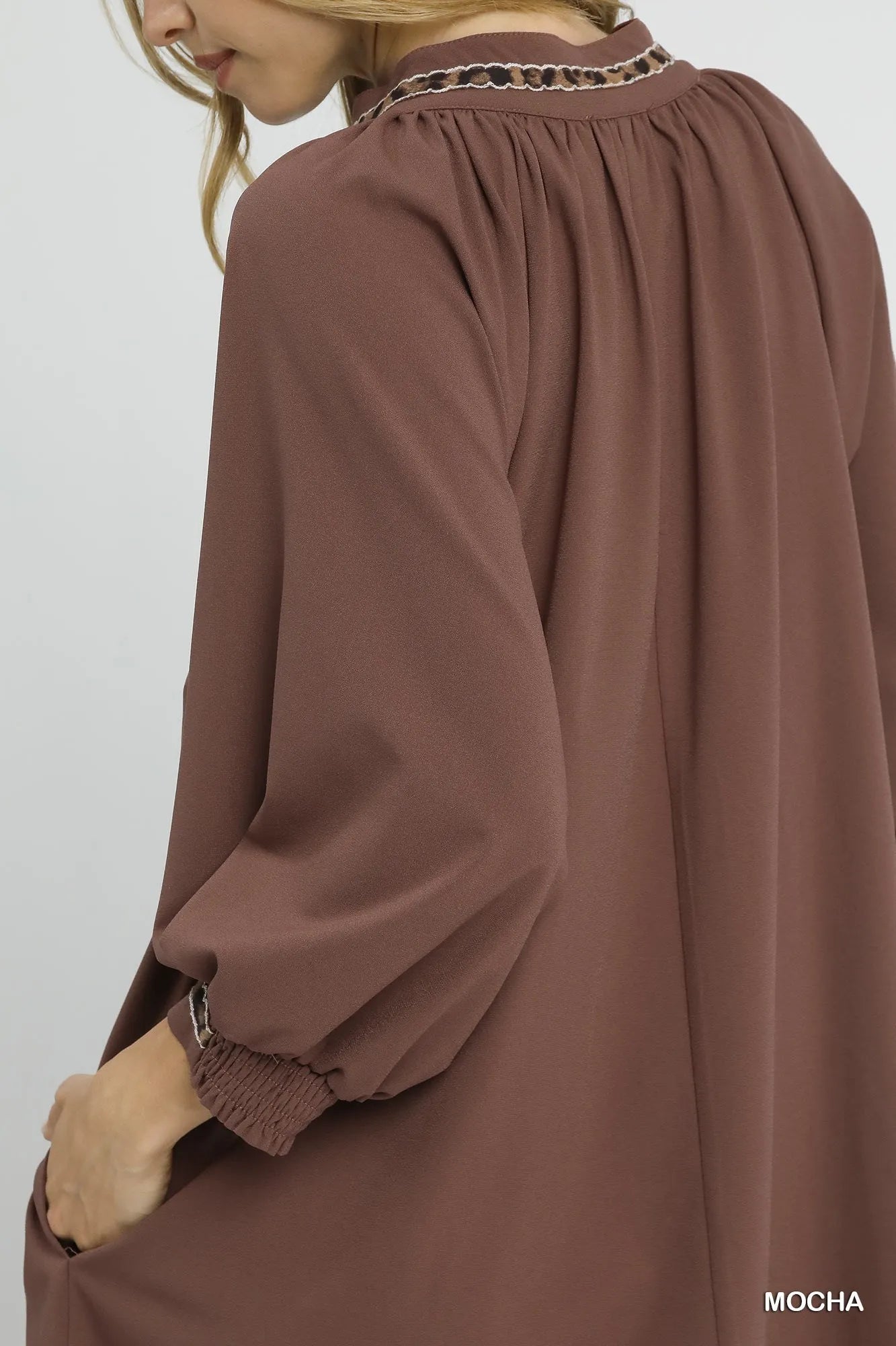 Mocha Umgee notched shift dress with trim detail, featuring a relaxed fit and stylish design, perfect for casual or dressy occasions.