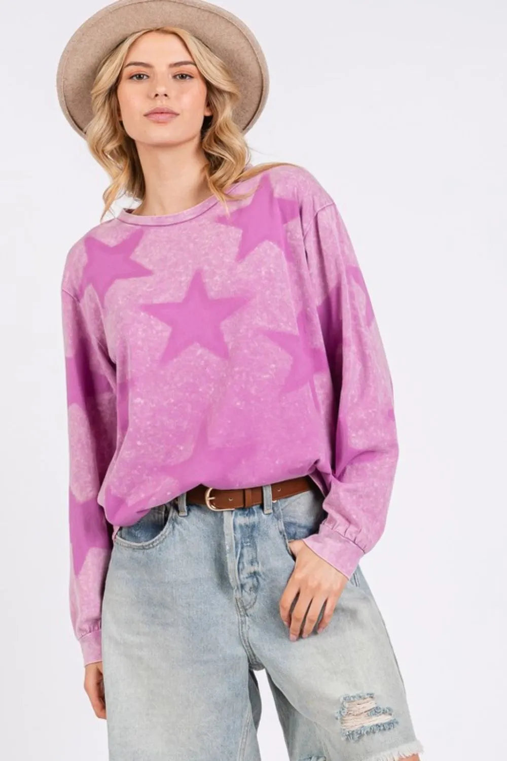SAGE + FIG mineral wash star pattern T-shirt in mauve with short sleeves and relaxed fit, featuring a celestial star design.