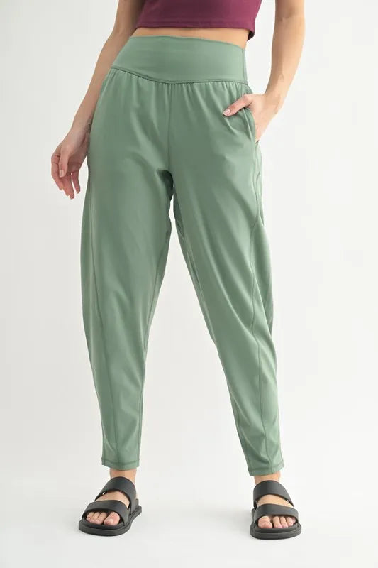 Trendsi MONO B Flowbarrel high waist active pants in moss green, stretchy workout leggings with a sleek fit and high-rise design.