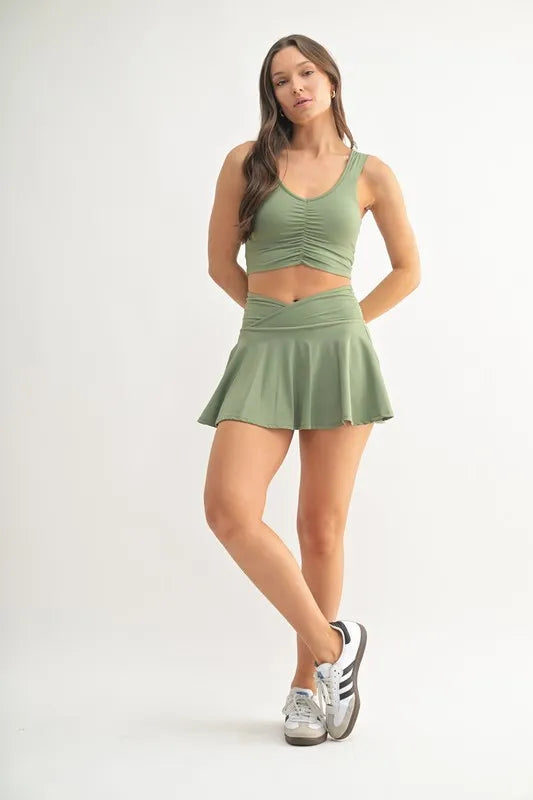 Trendsi MONO B moss green ruched front active tank top, sleeveless with a fitted design, ideal for workouts or casual wear.