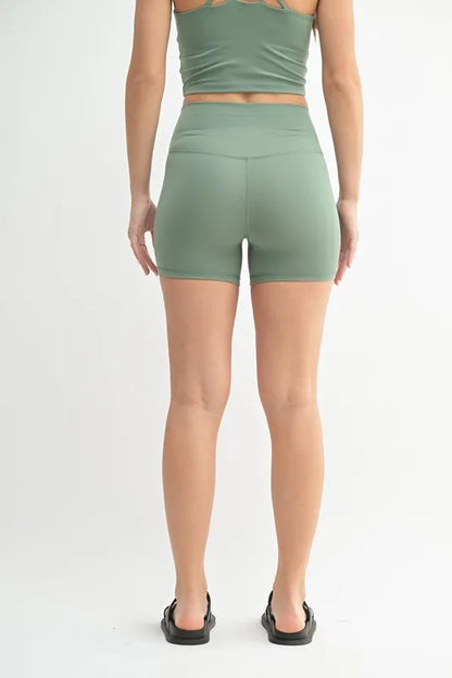 Trendsi Mono B Venice Cloud Light Contour Biker Shorts in moss green, featuring a high-waisted, stretch-fit design for active wear.