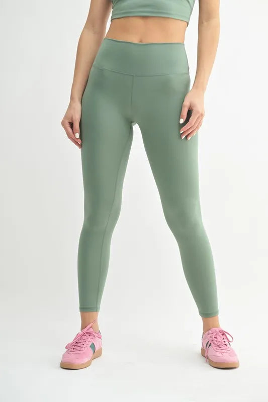 Trendsi MONO B Venice Cloud Light Contour high-waisted leggings in moss green, featuring comfortable fit and stylish design.