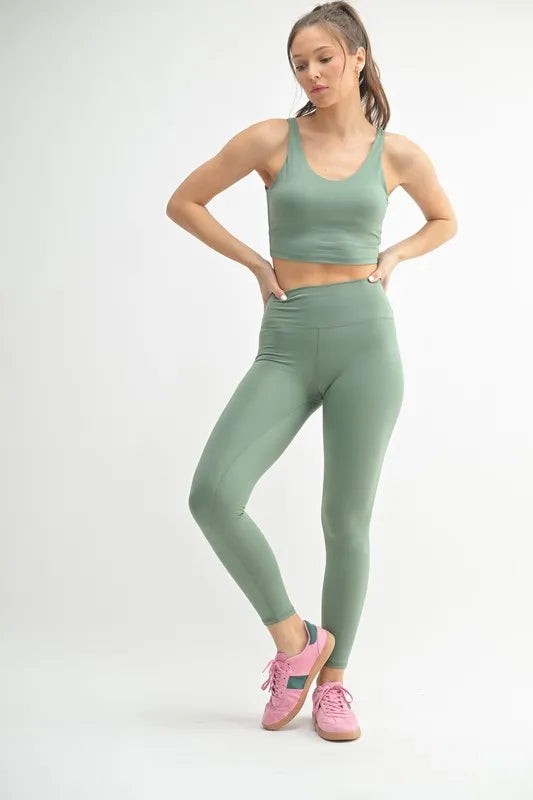 Trendsi MONO B Venice Cloud Light Contour high-waisted leggings in moss green, featuring a sleek, form-fitting design.