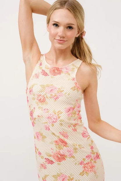 Trendsi floral fishnet bodycon midi dress featuring a vibrant floral pattern and fitted silhouette, perfect for stylish occasions.
