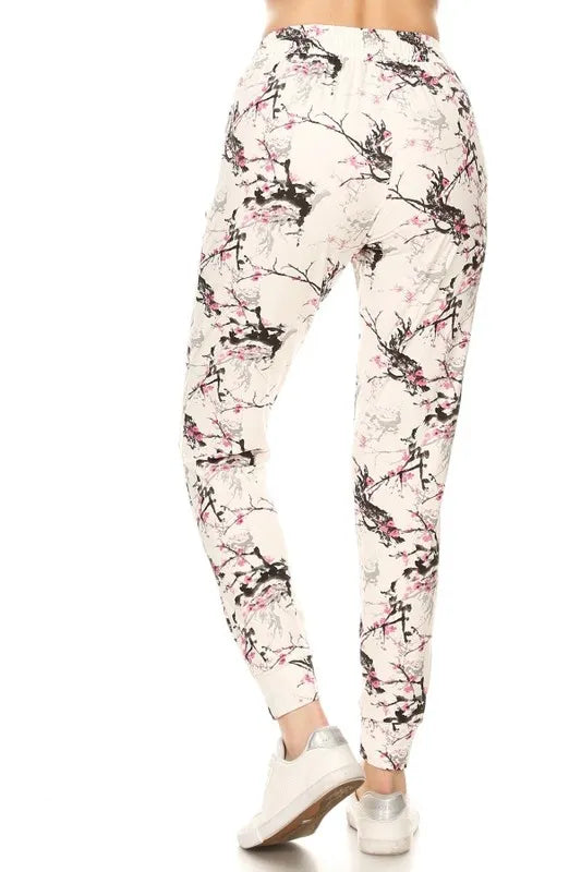 Plus size printed joggers from Trendsi, buttery soft leggings with a drawstring and full size fit, shown on a model.