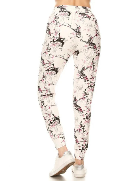 Plus size printed joggers from Trendsi, buttery soft leggings with a drawstring and full size fit, shown on a model.