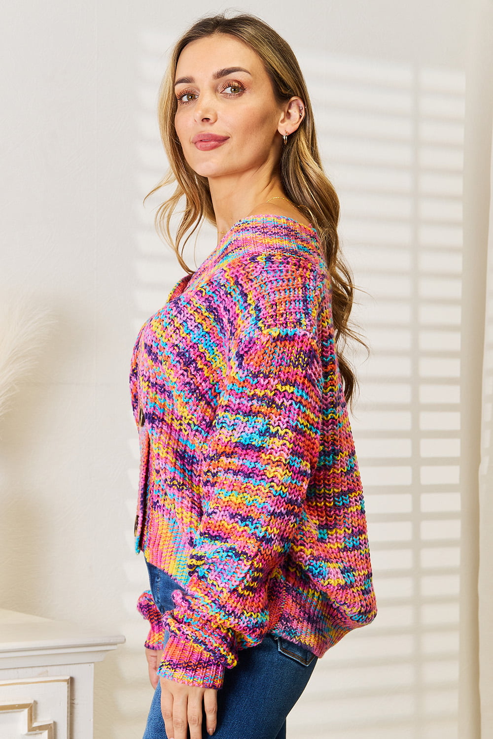 Multicolor woven angel wings pattern on a right V-neck long sleeve cardigan by Trendsi, featuring a cozy, stylish design.