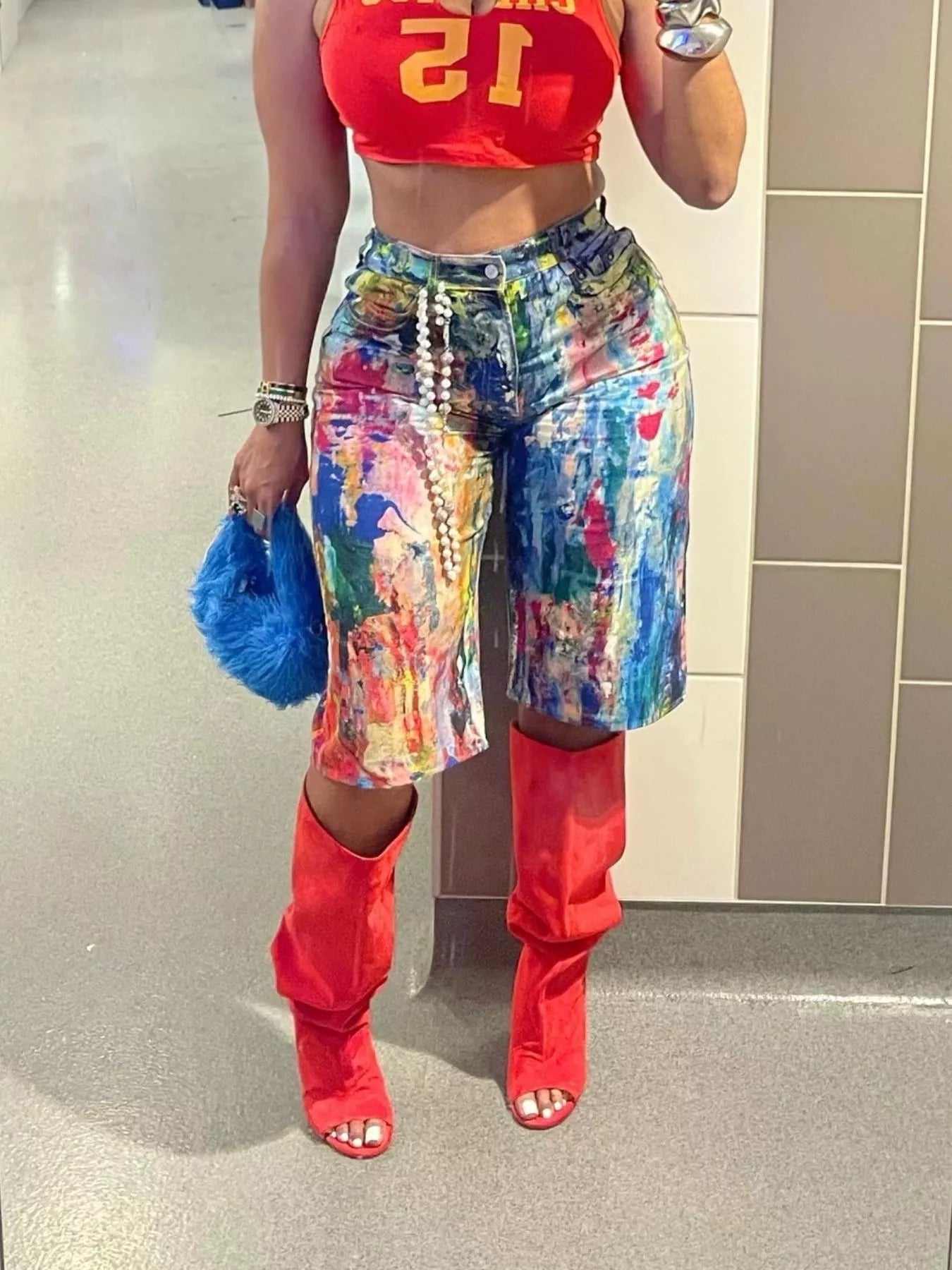 Multicolor artistic splash print shorts by Trendsi featuring vibrant, abstract patterns and a relaxed fit for casual wear.