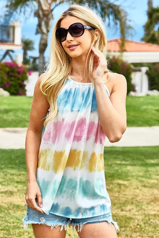 Multicolor tie-dye halter neck top by Trendsi featuring a stylish, vibrant design and sleeveless cut.
