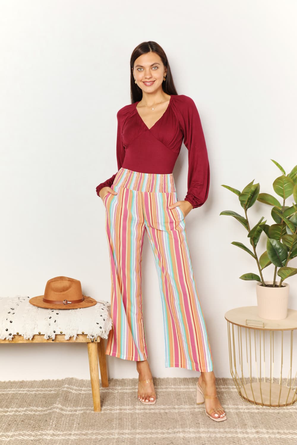 Multicolor striped smocked waist pants with pockets by Trendsi, casual and comfortable for everyday wear.