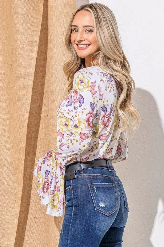 Mustard mauve floral printed bell sleeve casual top by Trendsi, featuring a relaxed fit and stylish bell sleeves.