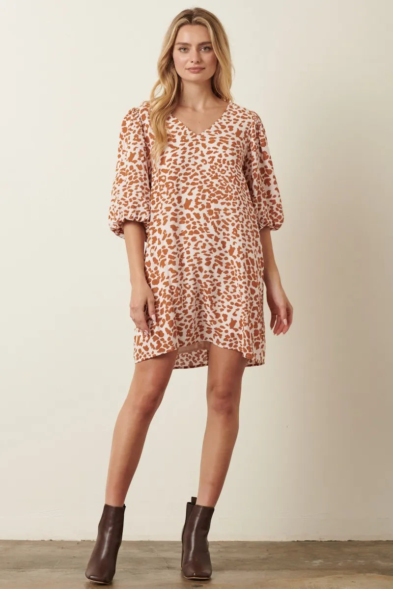 Mustard animal print puff sleeve mini dress by Mittoshop, stylish and trendy for casual or semi-formal wear.