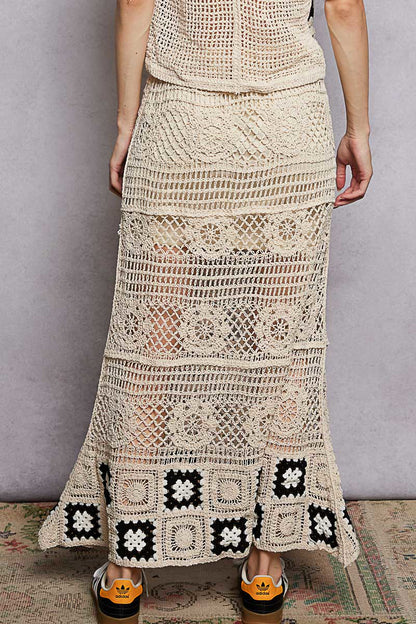 Natural black floral crochet maxi skirt with ruffled waistband and granny square weave, designed by Trendsi.