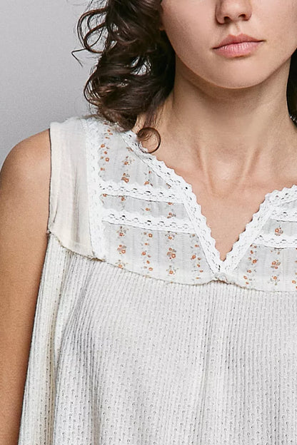 Floral double gauze patch sleeveless top with lace detail from Trendsi, featuring a relaxed fit and lightweight fabric.