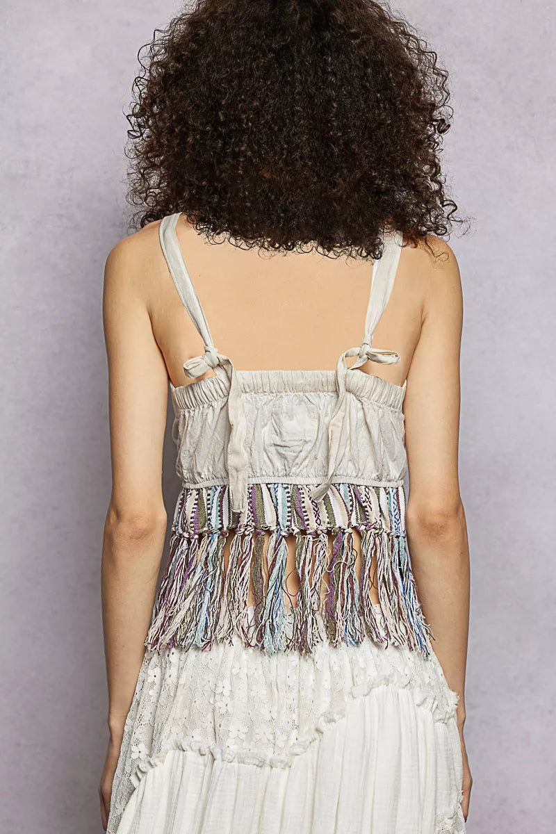 Natural-colored POL lace-up fringe hem tank top with lace detail, featuring a sleeveless design and casual, boho-inspired style.