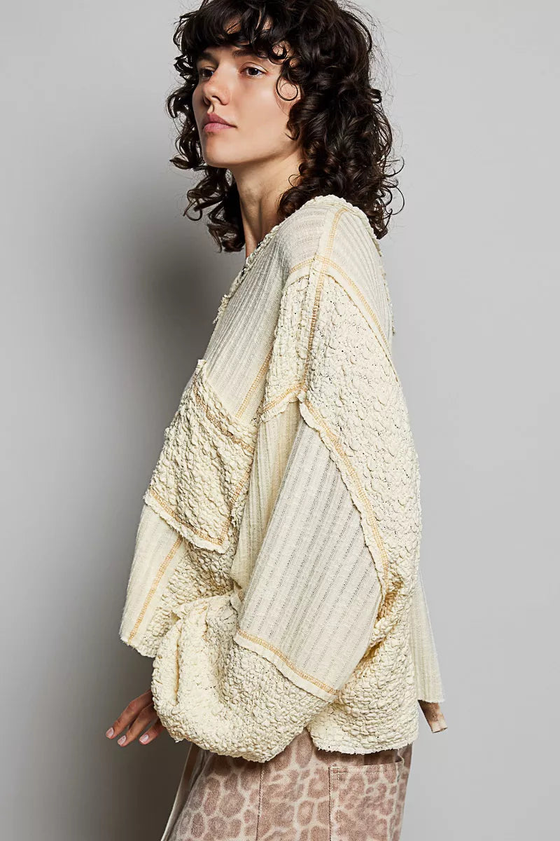 Natural V-neck long sleeve top with stitch detail, from Trendsi, featuring a casual, stylish design and soft fabric.