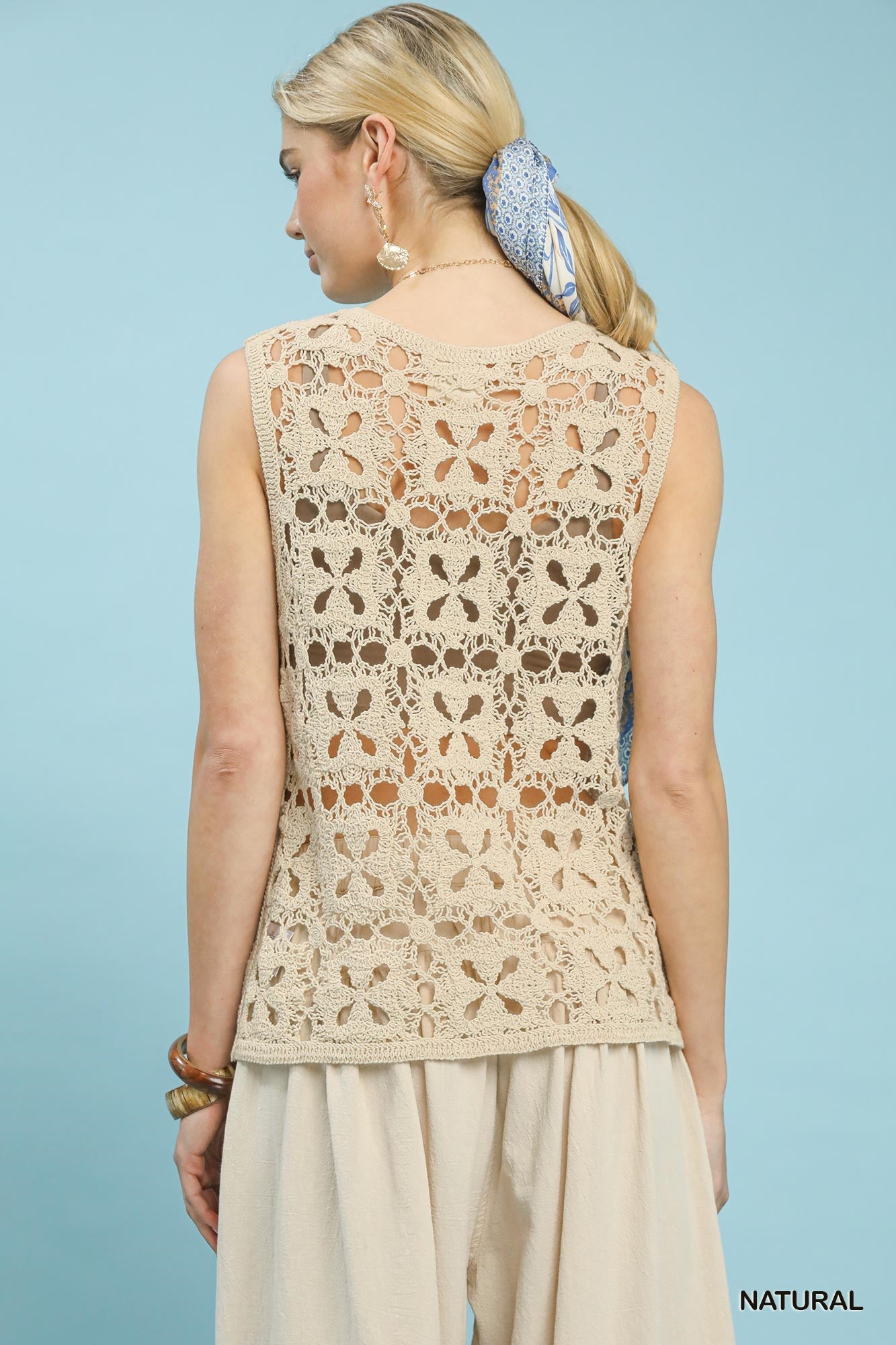 Natural beige sleeveless tank top with crochet flower motifs from Umgee, featuring a relaxed fit and casual style.