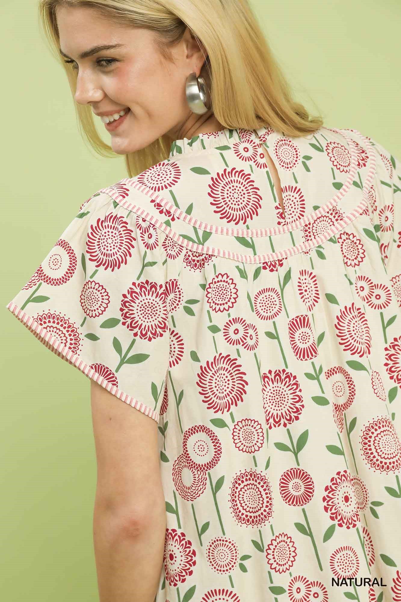 Natural S Umgee floral print tiered babydoll dress with flowy fabric and feminine design, perfect for casual or summer wear.