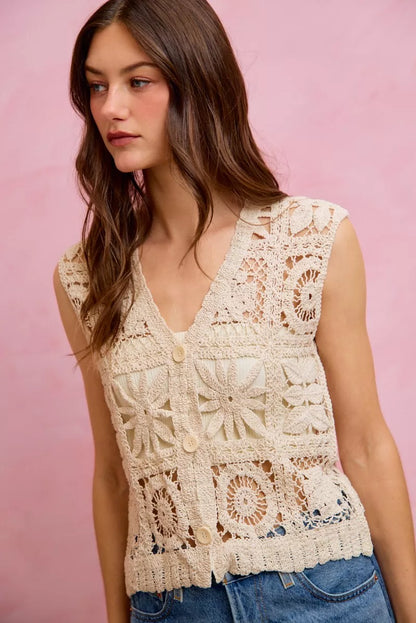 Natural crochet patterned sleeveless vest top by Trendsi, showcasing lightweight summer design with intricate crochet details.