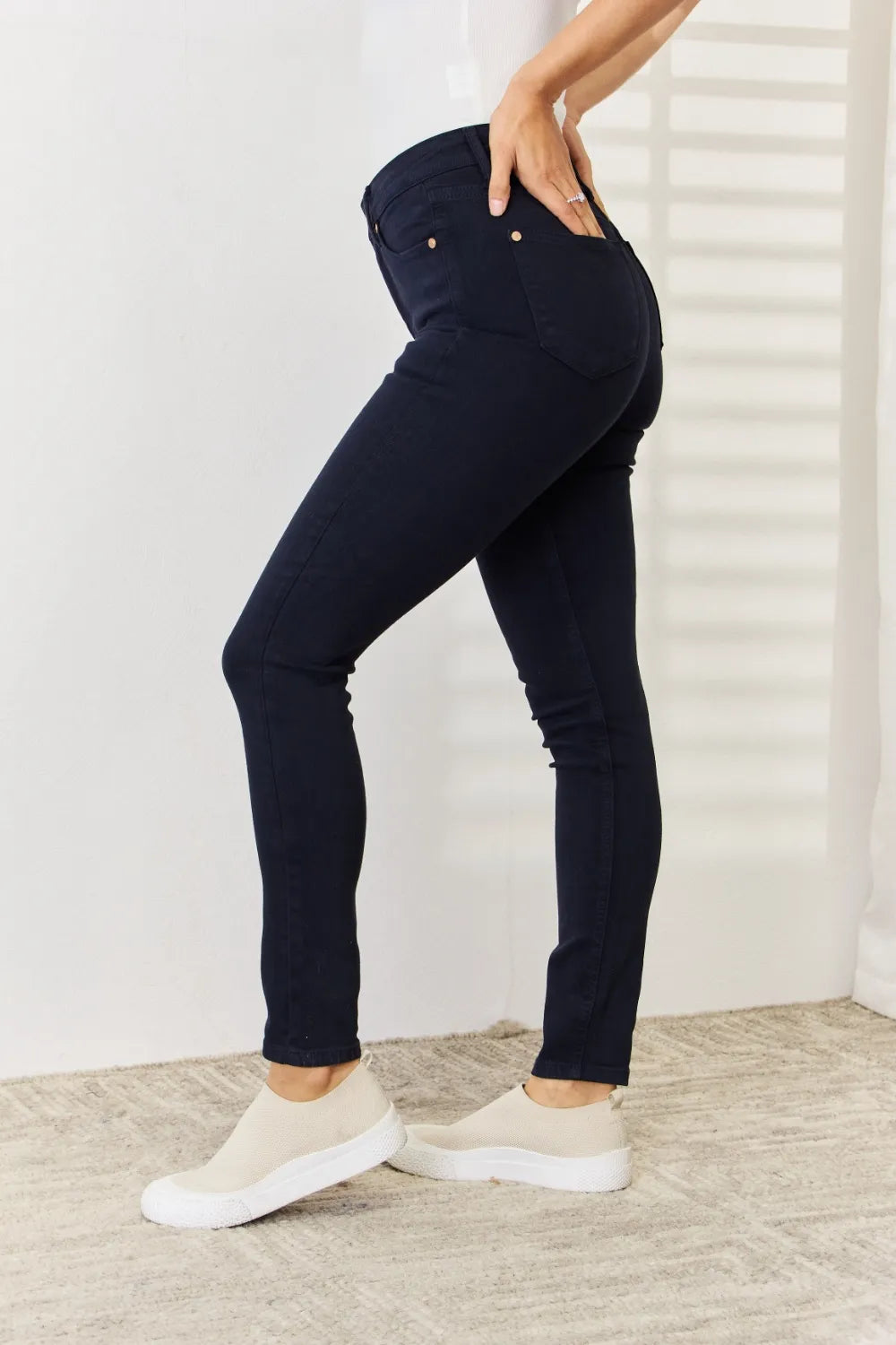 Navy Judy Blue full-size garment dyed tummy control skinny jeans with a fitted silhouette and classic five-pocket design.