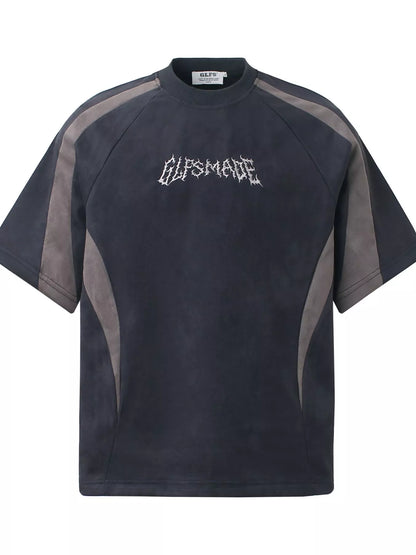Navy blue men's round neck T-shirt with embroidered letter design, made by Trendsi, casual and comfortable fit.