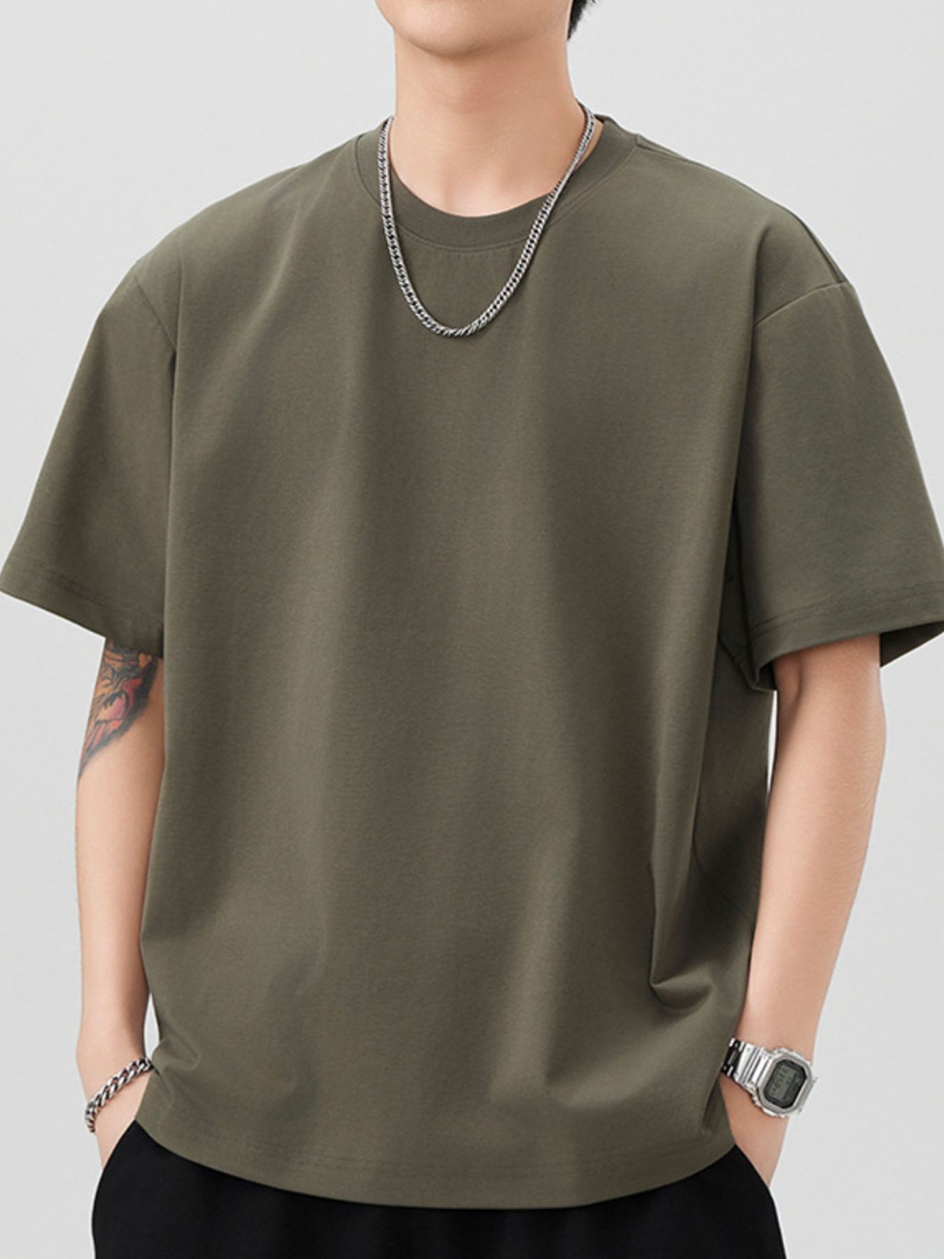 Navy blue men's plus size casual loose T-shirt from Trendsi, solid color, comfortable fit, suitable for everyday wear.