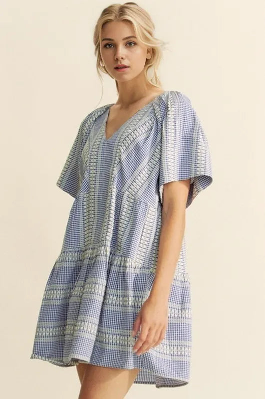Navy blue Davi & Dani embroidered stripe ruffled gingham mini dress with puff sleeves and ruffled hem, stylish and feminine.