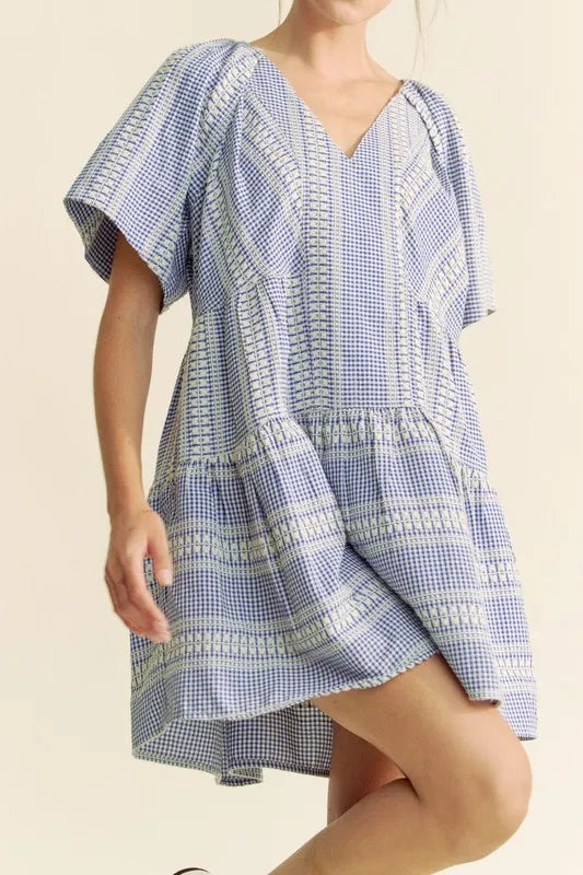 Navy blue Davi & Dani embroidered stripe ruffled gingham mini dress with puff sleeves and a fitted waist, casual summer style.
