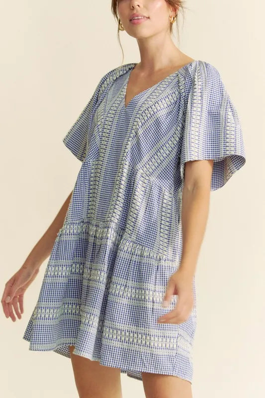 Navy blue Davi & Dani embroidered stripe ruffled gingham mini dress with ruffled sleeves and a fitted waist.