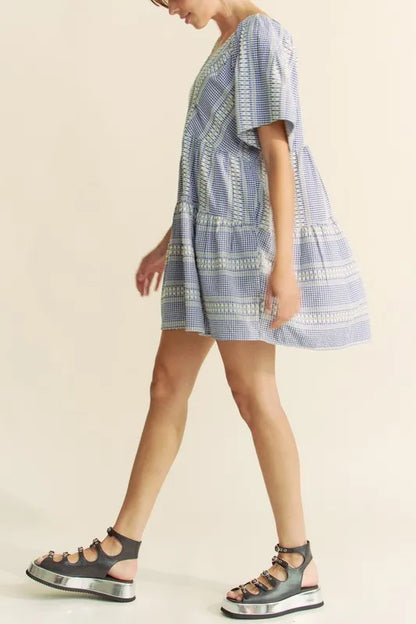 Navy blue Davi & Dani embroidered stripe ruffled gingham mini dress with short sleeves, fitted bodice, and playful ruffle details.