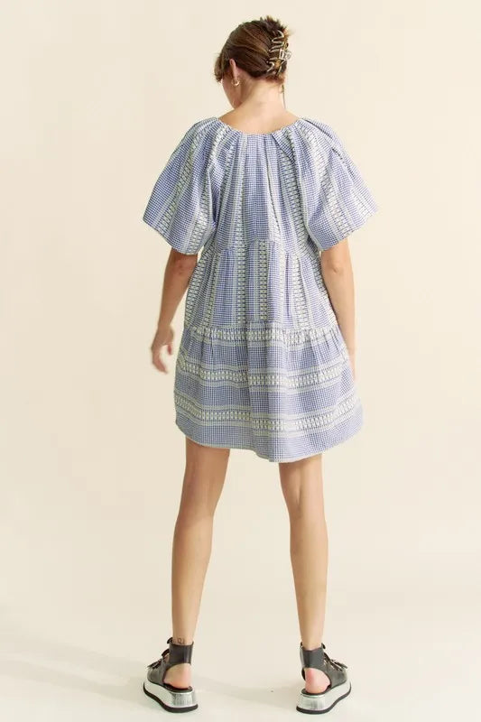 Navy blue Davi & Dani embroidered stripe ruffled gingham mini dress with short sleeves and a fitted waist, stylish and feminine.