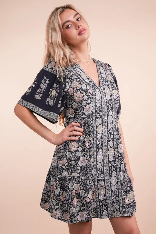 Navy mix Very J printed woven mini dress with shirring detail, short sleeves, and a fitted silhouette, perfect for casual wear.