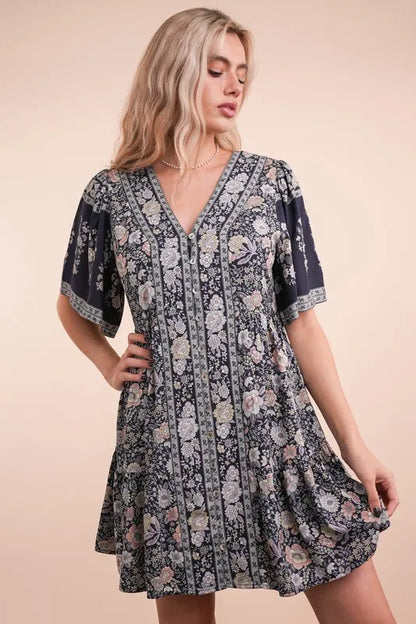 Navy printed woven mini dress with shirring details from Trendsi, featuring a fitted silhouette and stylish design.