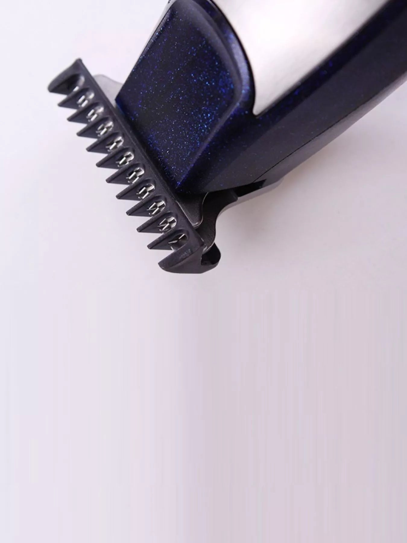 Navy cordless hair clipper by Trendsi with a sleek design, perfect for precise hair cutting and styling at home or salon.