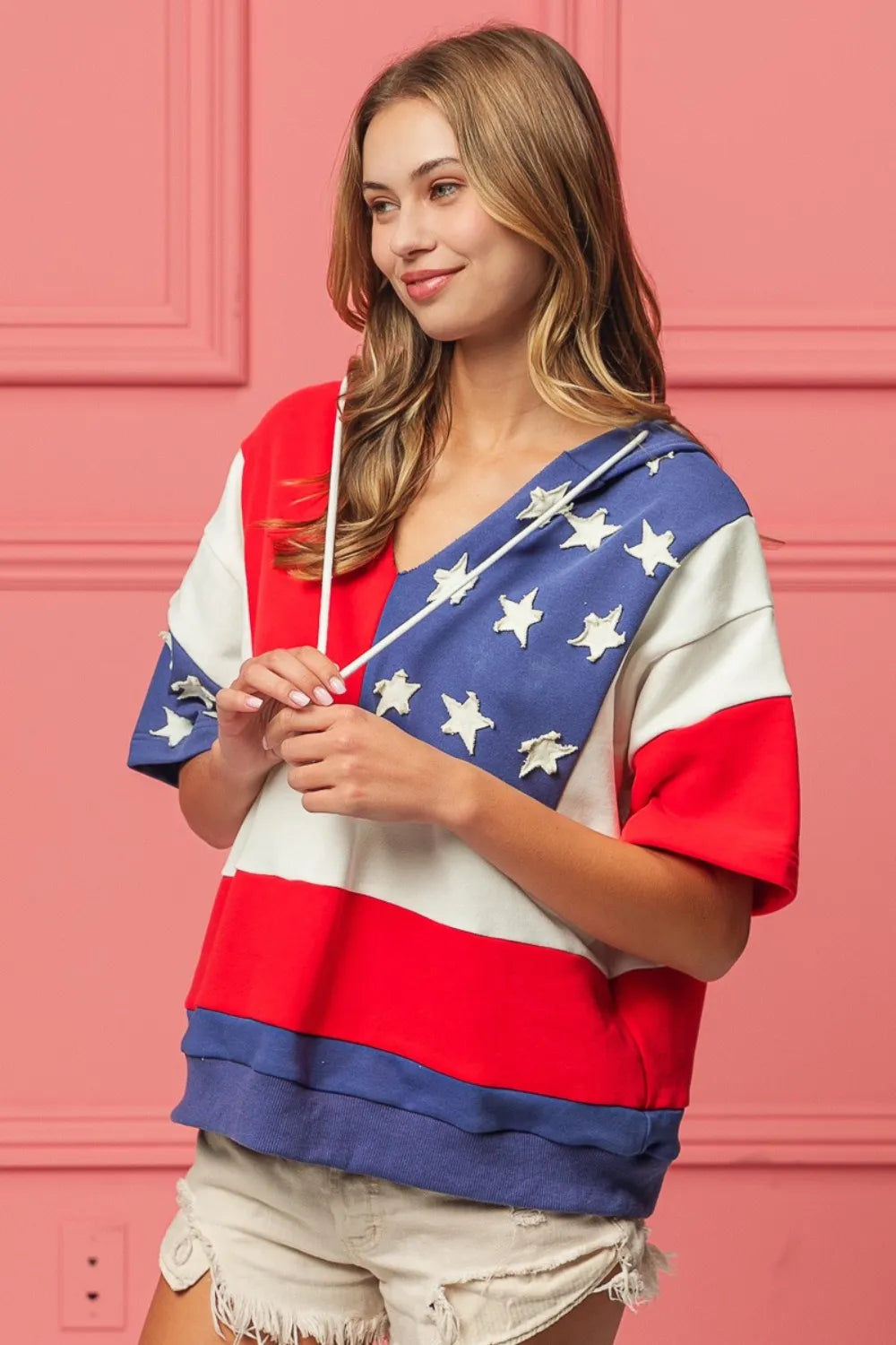 Navy and red American flag-themed hoodie by Trendsi, featuring bold flag print and casual fit for patriotic style.