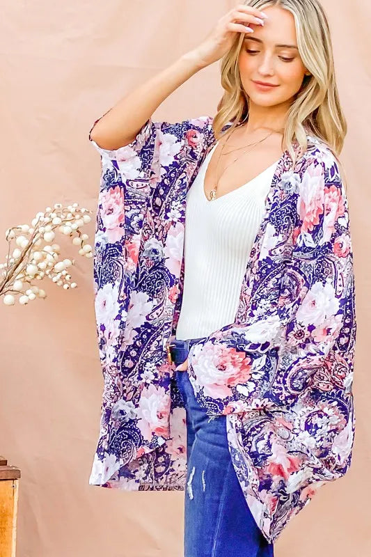 Navy floral print dolman sleeve kimono cardigan by Trendsi featuring lightweight fabric and relaxed fit.