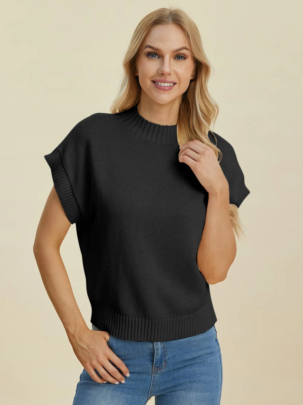 Navy double take full-size mock neck short sleeve sweater by Trendsi, made of soft knit fabric, displayed on a hanger.