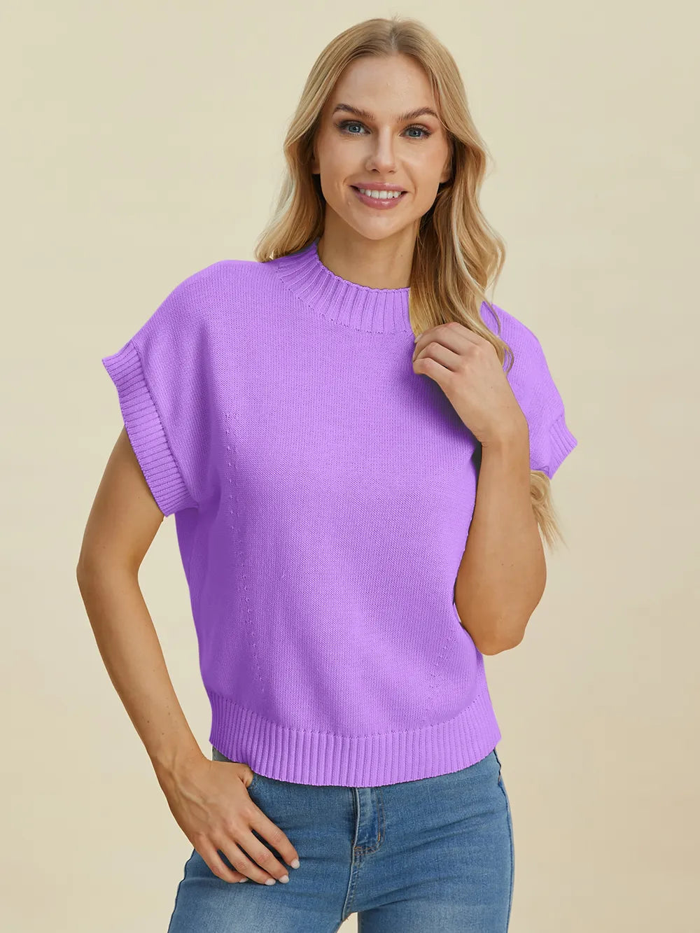 Navy Trendsi Double Take full-size mock neck short sleeve sweater displayed on a mannequin, showcasing its stylish design and fit.