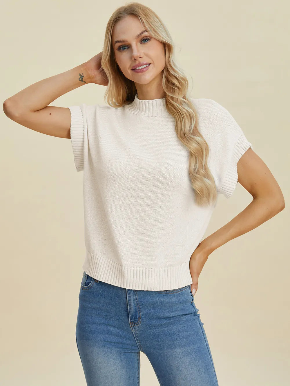Navy Trendsi Double Take full-size mock neck short sleeve sweater displayed on a hanger.