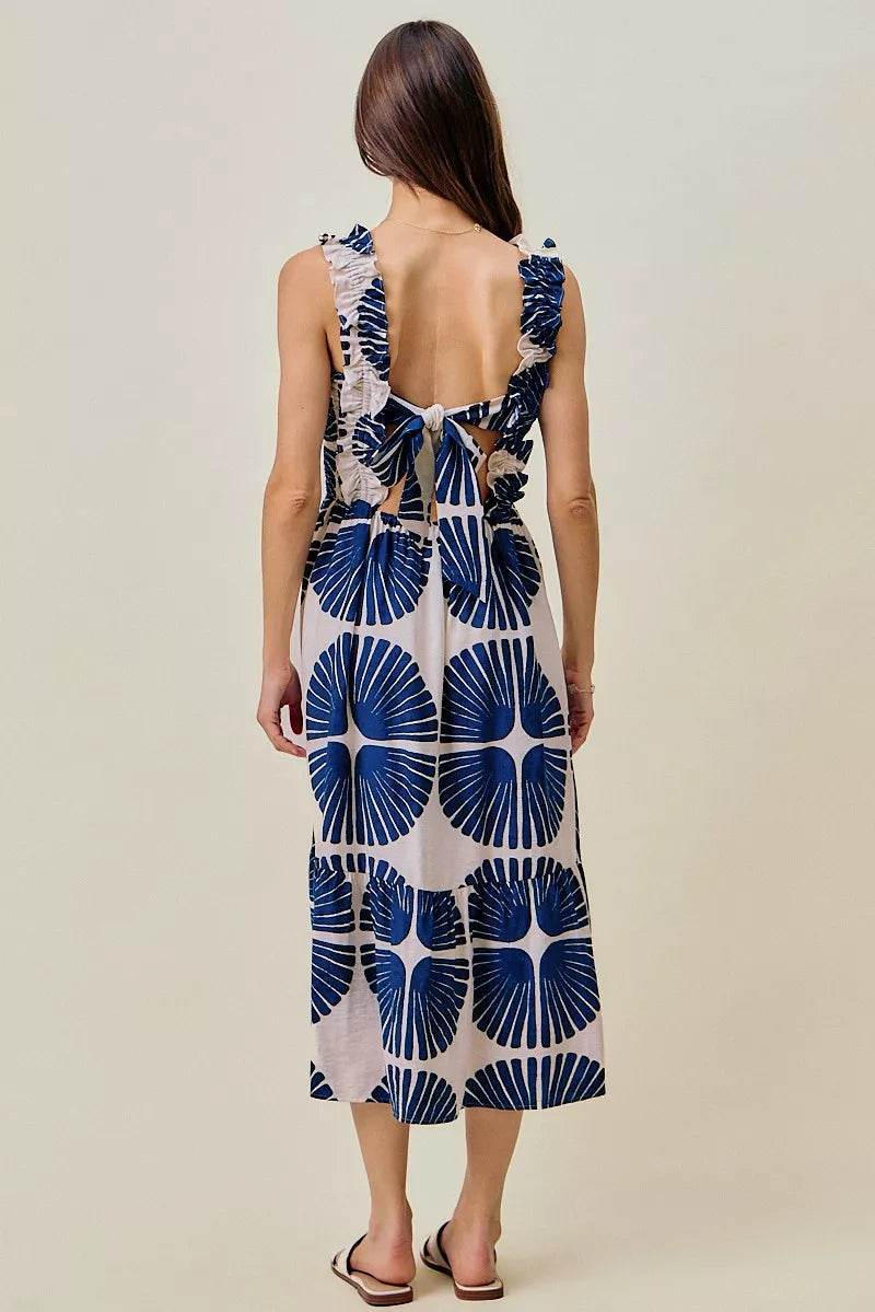 Navy SO ME abstract print midi dress with smocked bodice, tiered design, and lined fabric, perfect for casual and summer wear.